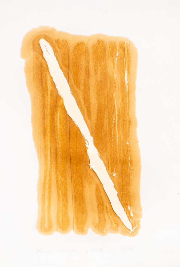 Papier pokryty złocistym olejem z białą, diagonalną linią