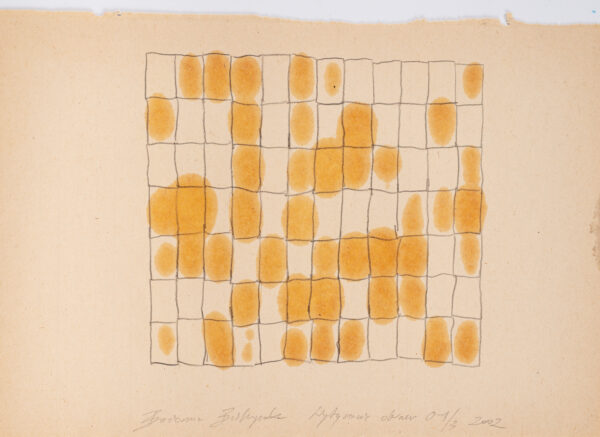 Papier pokryty olejnymi plamkami w prostokątnych polach