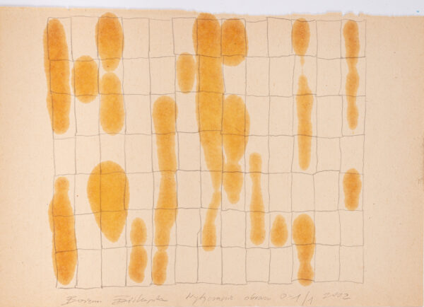 Papier pokryty olejnymi plamkami w prostokątnych polach